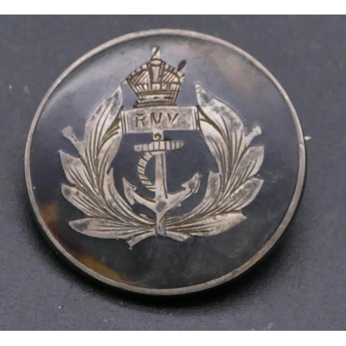 460 - A London silver and tortoiseshell naval circular badge, 2.7cm diameter.