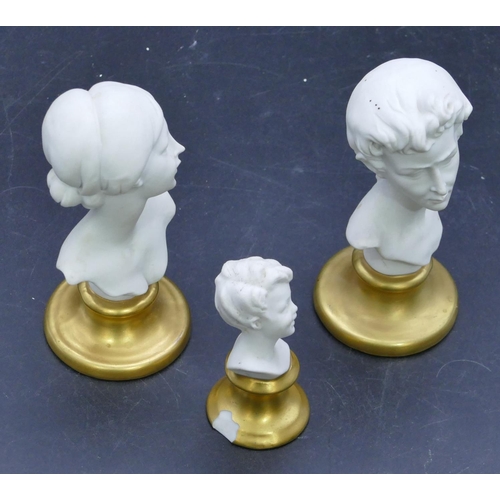 60 - A pair of Naples small Bisque busts of gentleman and lady on round gilt bases, 12cm high and a simil... 