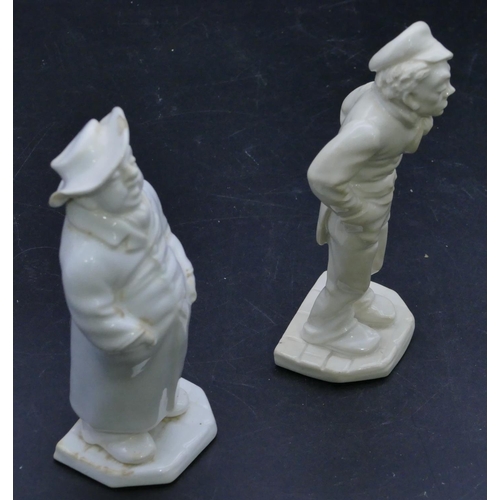 66 - 2 Royal Doulton Dickens caricatures on white ground (chip to hat on 1), 14cm high. (2)