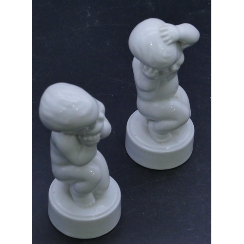 67 - 2 B&G Denmark white china figures of kneeling children on round bases, 11.5cm high. (2)