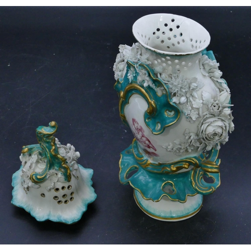 71 - An oval china bulbous shaped lidded vase with pierced and embossed encrusted acorn, leaf and floral ... 