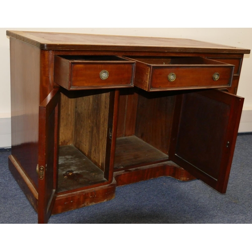 748 - A 19th Century mahogany kneehole writing desk with red inset top, centre drawer flanked by 2 smaller... 