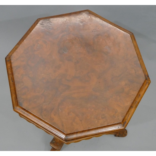 753 - A 19th Century burr walnut octagonal shaped workbox with hinged lid (hinges in need of restoration),... 