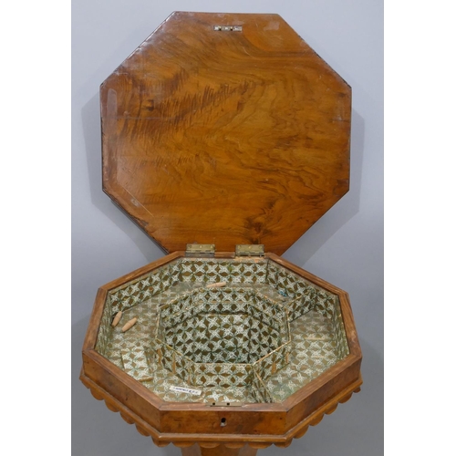 753 - A 19th Century burr walnut octagonal shaped workbox with hinged lid (hinges in need of restoration),... 