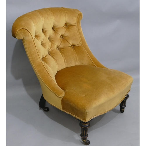 755 - An ebonised nursing chair with yellow velvet over stuffed seat and button back, on turned legs with ... 