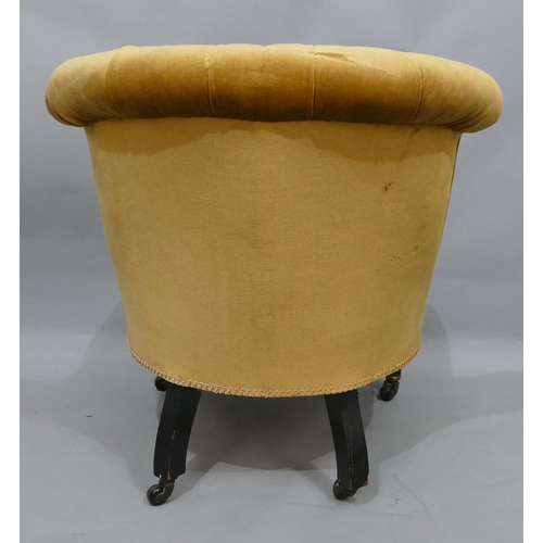 755 - An ebonised nursing chair with yellow velvet over stuffed seat and button back, on turned legs with ... 