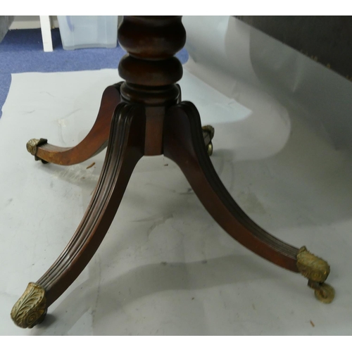 760 - A 19th Century mahogany Pembroke table with banded top, 1 drawer, 1 dummy drawer, on centre column s... 