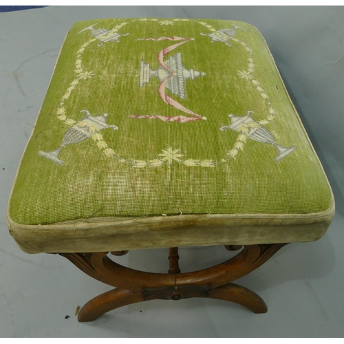 761 - A 19th Century mahogany framed foot stool with green needlework overstuffed seat with vase and swag ... 