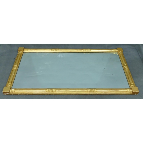 762 - A 19th Century gilt wall mirror with half round column supports, 110cm wide, 57.5cm high.