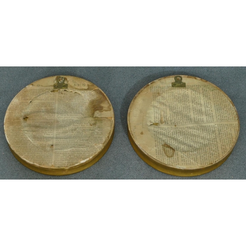 764 - A pair of small 19th Century convex wall mirrors with inner ball motifs, each 20.3cm diameter.