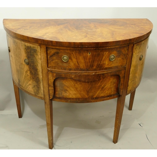 766 - A 19th Century mahogany demi-lune sideboard with 2 centre drawers flanked by 2 panelled doors, on 4 ... 