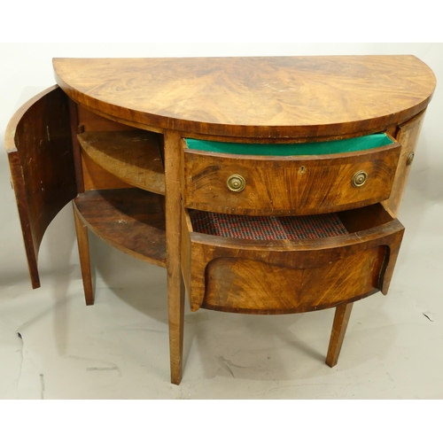 766 - A 19th Century mahogany demi-lune sideboard with 2 centre drawers flanked by 2 panelled doors, on 4 ... 