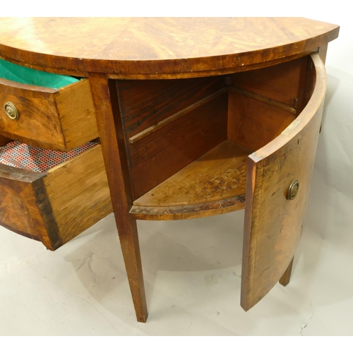 766 - A 19th Century mahogany demi-lune sideboard with 2 centre drawers flanked by 2 panelled doors, on 4 ... 