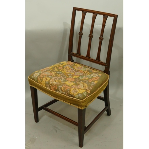 768 - A 19th Century mahogany single chair with reeded bar back, needlework overstuffed seat on square tap... 