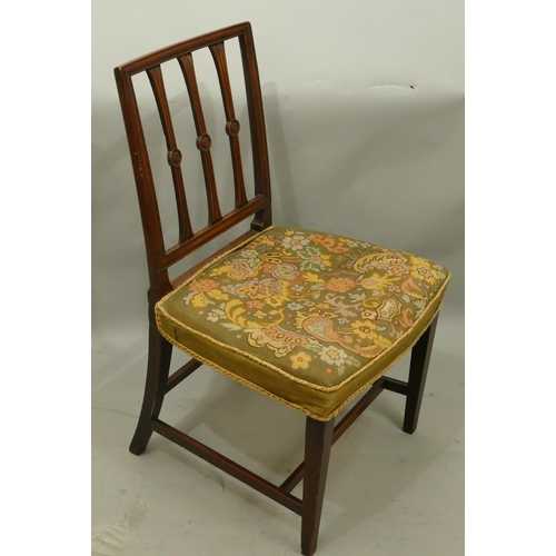 768 - A 19th Century mahogany single chair with reeded bar back, needlework overstuffed seat on square tap... 