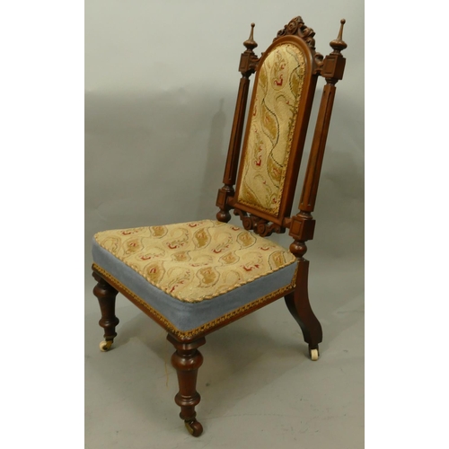 770 - A 19th Century walnut nursing chair with reeded support, needlework overstuffed seat and part back, ... 