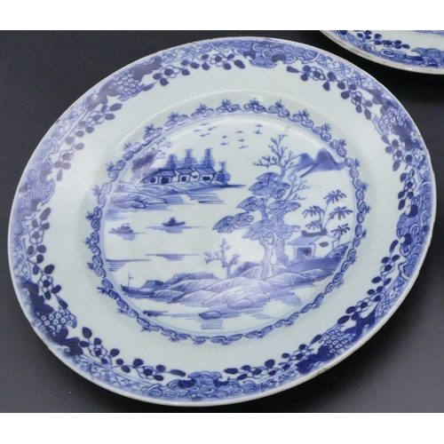 81 - A set of 3 18th Century Chinese blue and white plates depicting river and landscape (slight chips to... 