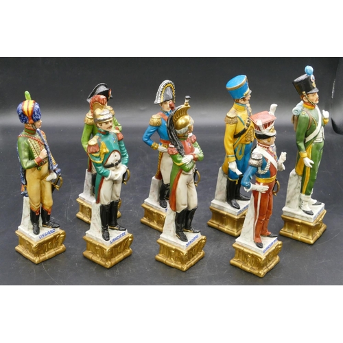 102 - A set of 8 Naples china figures of various military gentlemen 