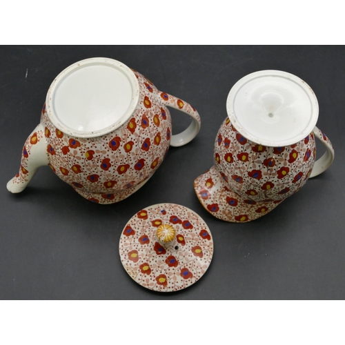 106 - A 19th Century Pearlware round bulbous shaped teapot and matching cream jug on white and red ground ... 