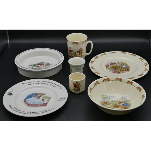 108 - A Wedgwood child's Peter Rabbit bowl and similar plate and small cup, a Royal Doulton Bunnykins chil... 