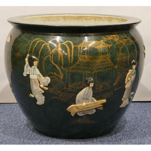 114 - A reproduction Oriental large round bulbous shaped jardiniere on green ground with raised and painte... 