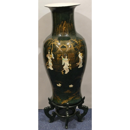 115 - A large reproduction Oriental round bulbous thin necked trumpet shaped floral vase on green ground w... 