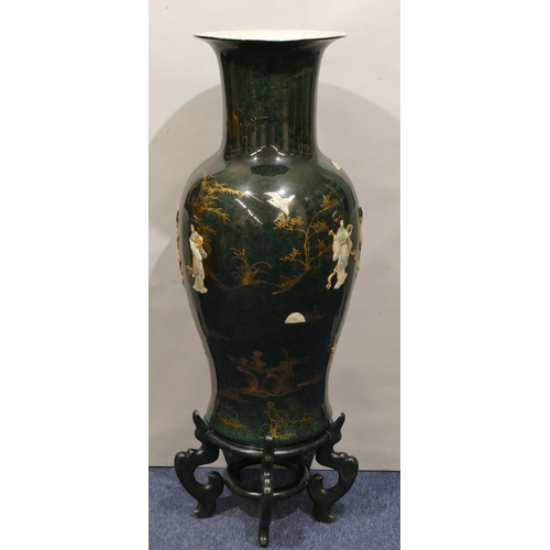 115 - A large reproduction Oriental round bulbous thin necked trumpet shaped floral vase on green ground w... 