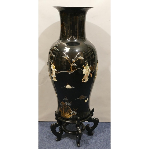 116 - A large reproduction Oriental round bulbous thin necked trumpet shaped floral vase on black ground w... 