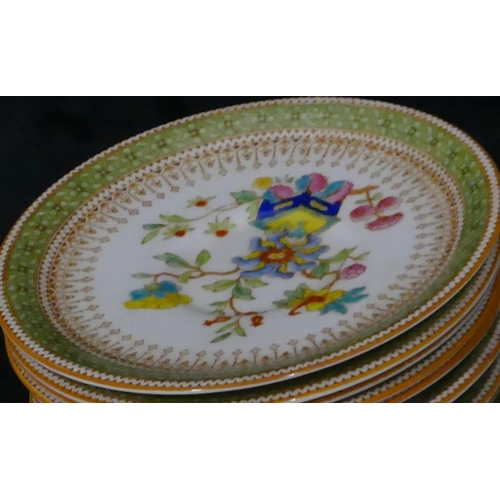 118 - A set of 8 Royal Worcester side plates on white and green ground with multi-coloured floral and gilt... 