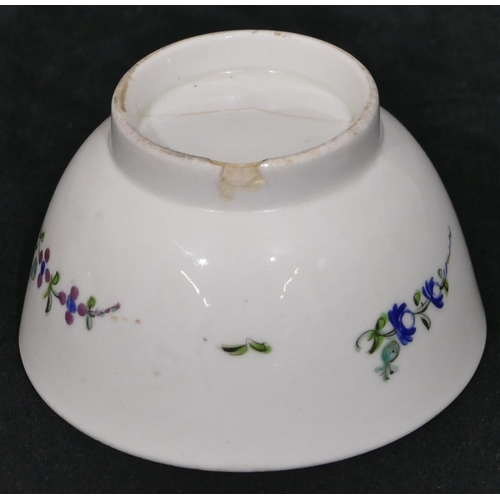 119 - A early 19th Century Newhall tea bowl and saucer on white ground with puce, blue and green floral le... 