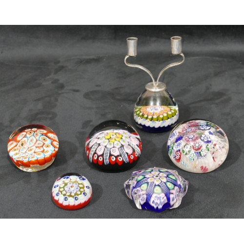 127 - A Strathearn millefiori paperweight mounted with 2 candlesticks, 5 other millefiori paperweights (6)