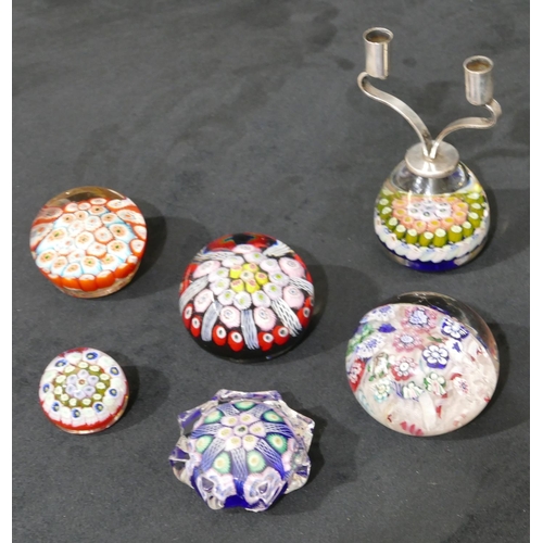 127 - A Strathearn millefiori paperweight mounted with 2 candlesticks, 5 other millefiori paperweights (6)