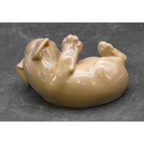 13 - A Royal Copenhagen figure of a puppy lying on its back, 1408, 11cm long.