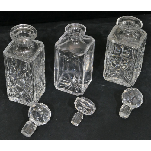 132 - 3 various square heavy cut glass decanters with stoppers, largest 27cm high.