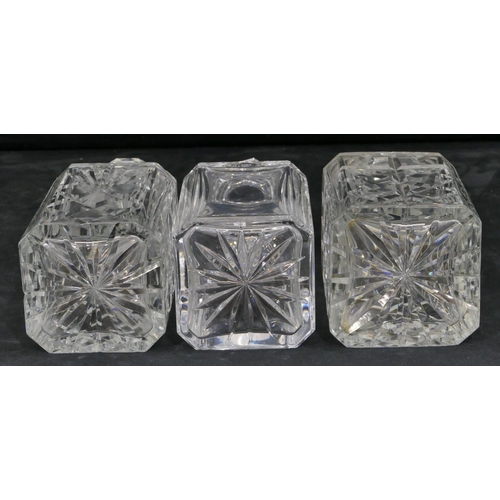 132 - 3 various square heavy cut glass decanters with stoppers, largest 27cm high.