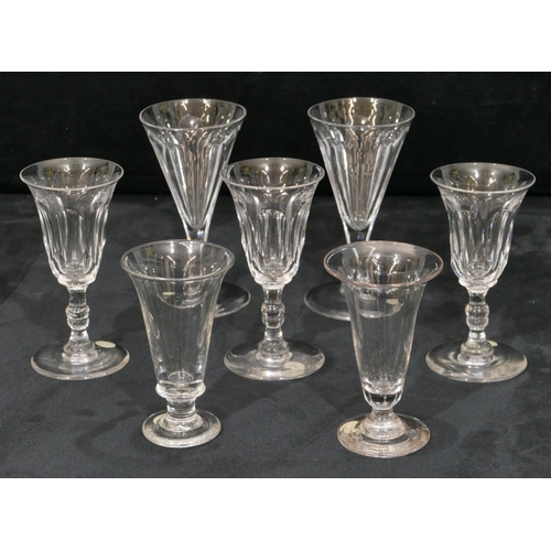 133 - A 19th Century cut glass round trumpet shaped wine glass with thumb pattern decoration, on round swe... 