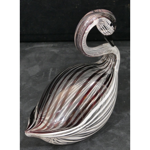 137 - A Lauretta glass figure of a swan on clear ground with striped decoration, 25cm long, 19cm high.