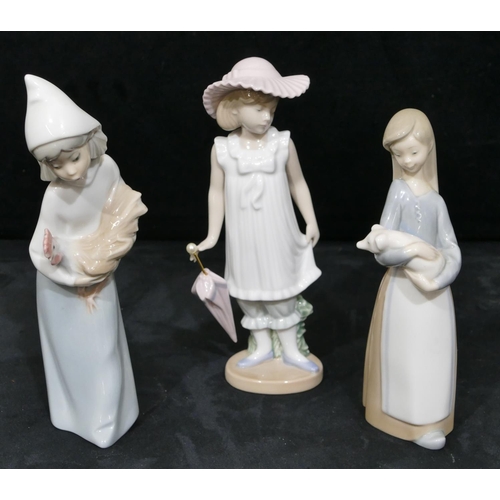 139 - 3 Lladro figures of young ladies, 1 holding a parasol, 19cm high, 1 holding pig, 17.5cm high and 1 h... 