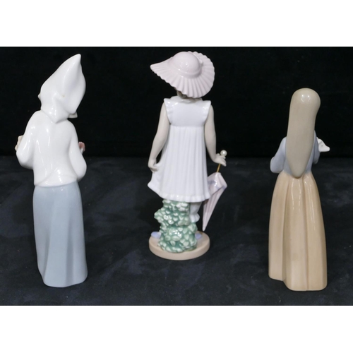 139 - 3 Lladro figures of young ladies, 1 holding a parasol, 19cm high, 1 holding pig, 17.5cm high and 1 h... 