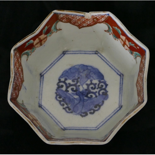 143 - A 19th Century Oriental Imari pattern octagonal shaped bowl with crinkled rim, mounted in gilt metal... 