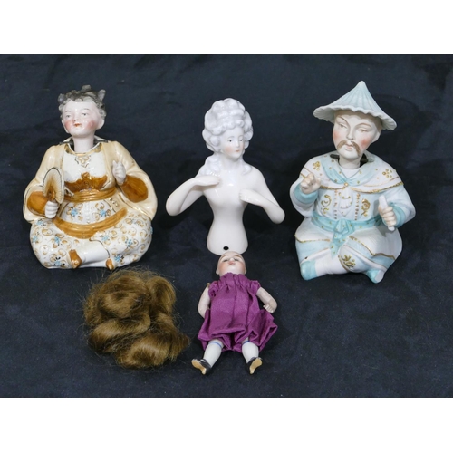 147 - A miniature porcelain doll with jointed body (hair loose), 9cm, a porcelain figure of a young lady a... 