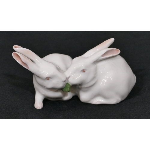 151 - A Royal Copenhagen white china group of 2 rabbits, number 518, 11cm wide