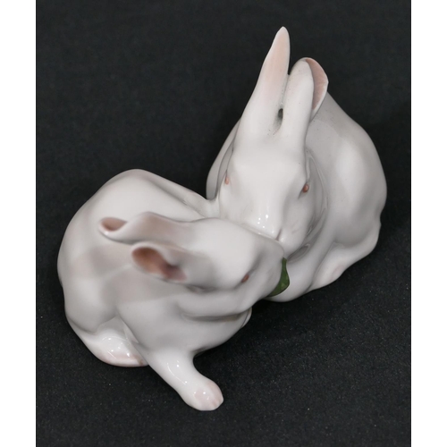 151 - A Royal Copenhagen white china group of 2 rabbits, number 518, 11cm wide