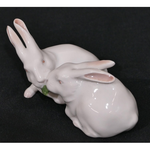 151 - A Royal Copenhagen white china group of 2 rabbits, number 518, 11cm wide