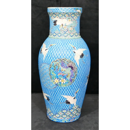 153 - A Japanese round bulbous thin necked vase on turquoise ground with coloured crane, floral, leaf and ... 