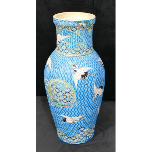 153 - A Japanese round bulbous thin necked vase on turquoise ground with coloured crane, floral, leaf and ... 