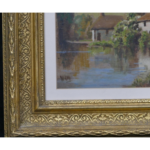 183 - A pair of oil on boards depicting cottages on riverbank (both indistinctly initialled WHM) in gilt f... 