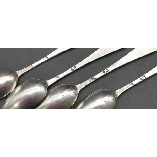 212 - 4 odd silver teaspoons, a cut glass pepperpot with Georgian silver top, another cut glass pepperpot ... 