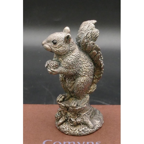 215 - A modern Comyns silver mounted figure of a squirrel (filled), 8.2cm high