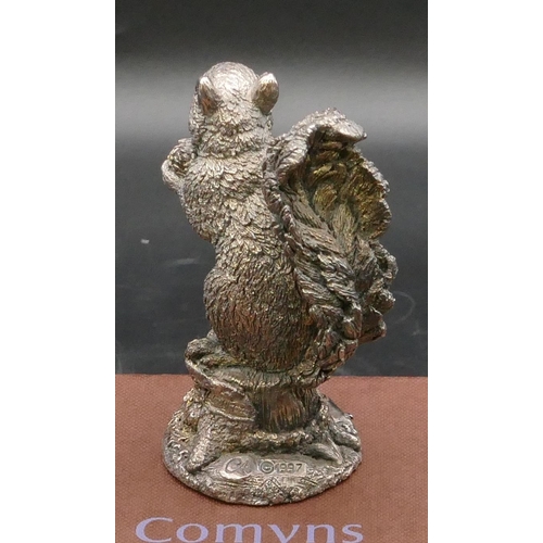 215 - A modern Comyns silver mounted figure of a squirrel (filled), 8.2cm high